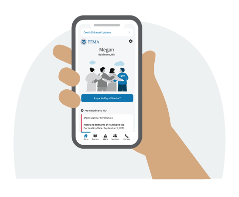 Hand holding smart phone with fema app open